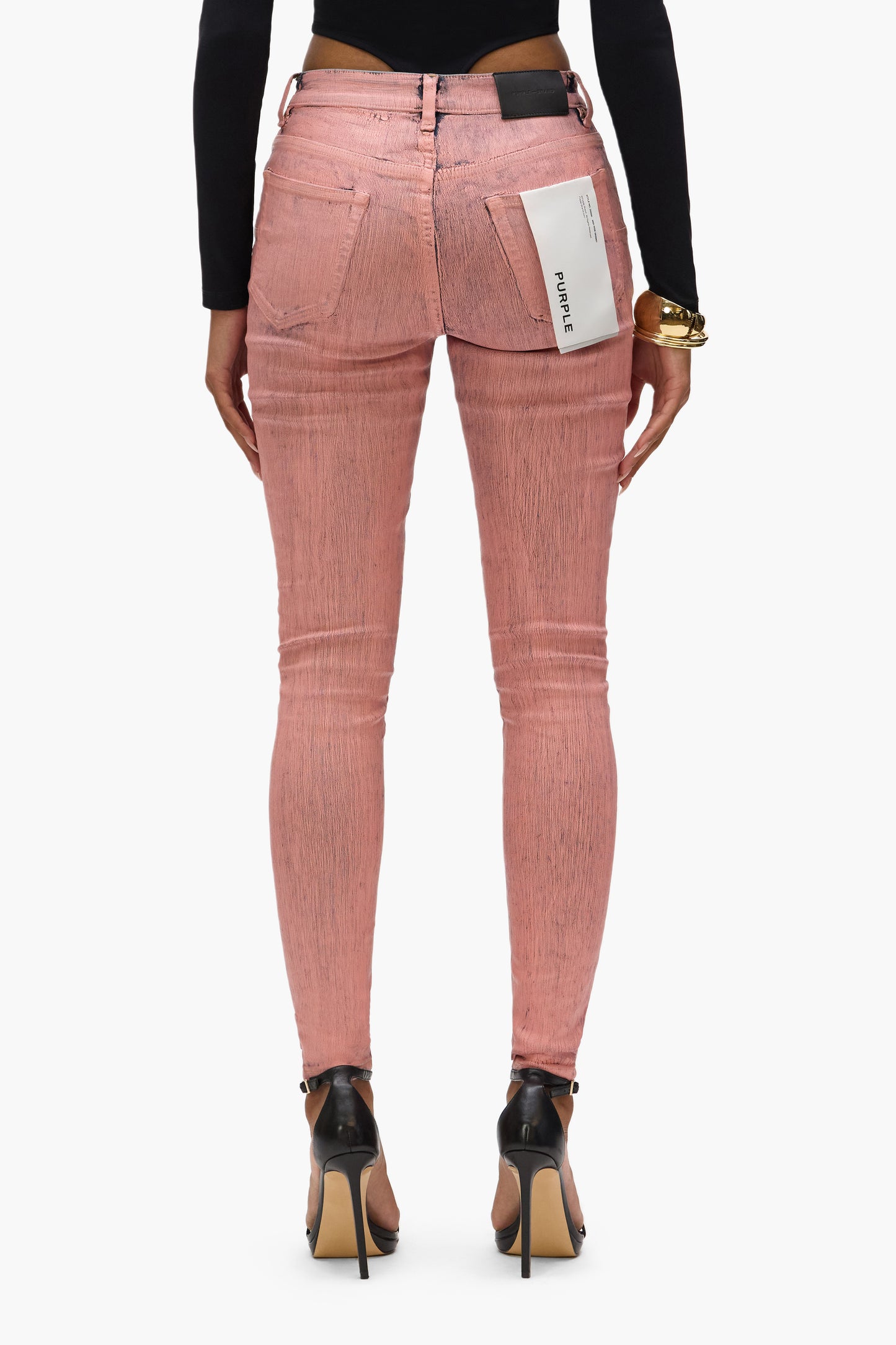 Skinny Paint Job pink mid-rise skinny denim with five pocket styling and reinforced belt loops.