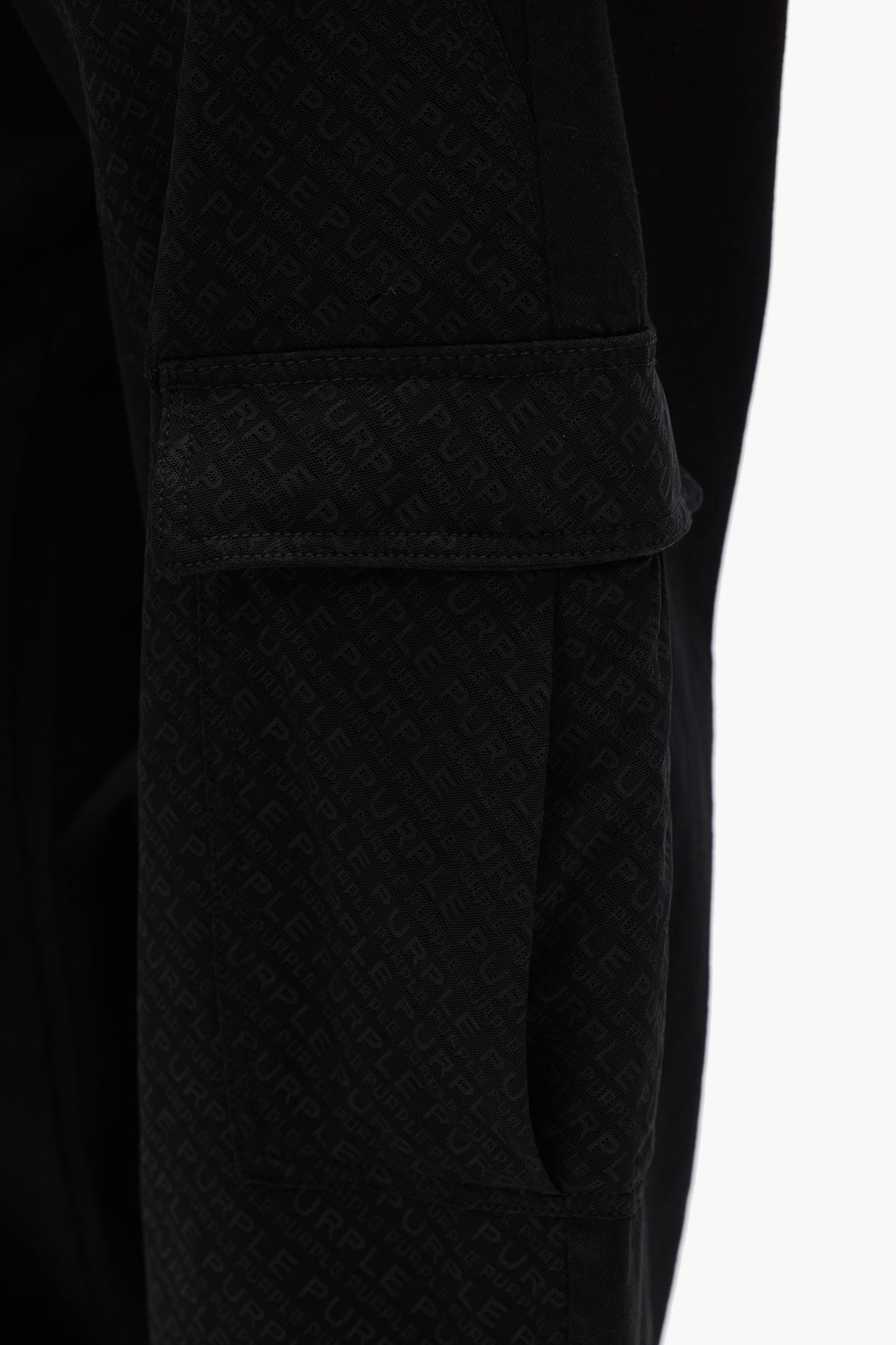 Barrel Fit Cargo Denim with cargo pockets and purple logo mesh panels, sizes 24 to 34.
