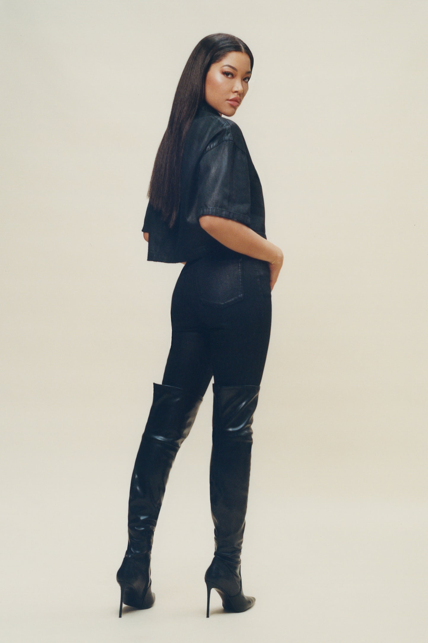 Washed Black Crop Shirt Coated with embossed logo and purple branded snaps, oversized fit.