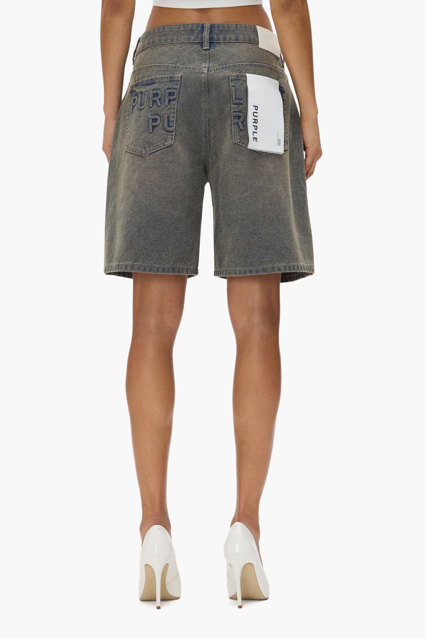 Embossed Logo Short in low rise, loose fit with mid thigh length and five pocket styling.
