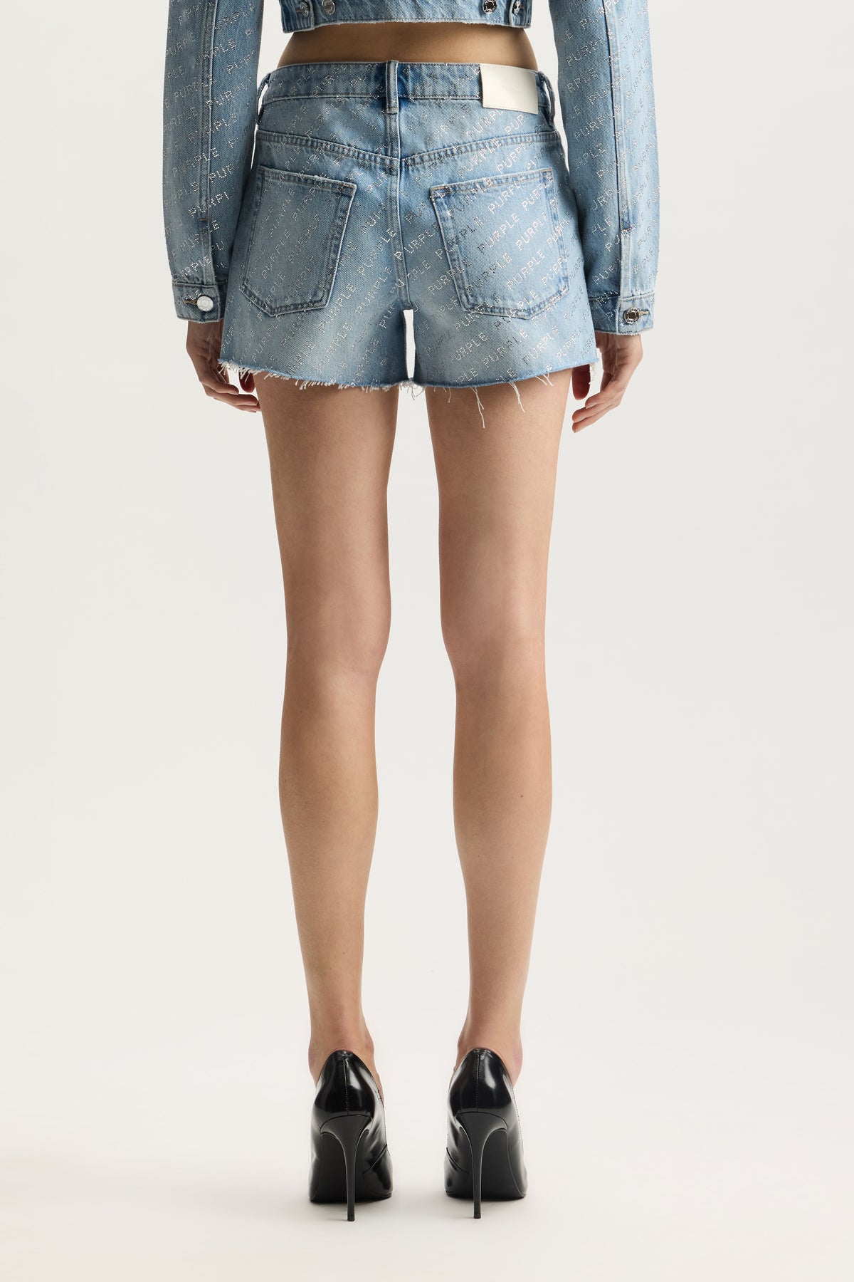 Logo Bling Cut Off Short Denim with embellished hand-sewn crystal jewels, mid rise, raw hem.