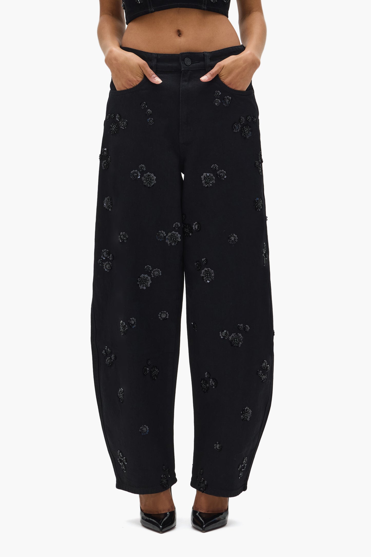 Embellished Barrel Leg denim with sequin embroidery, 33" inseam, and barrel fit.