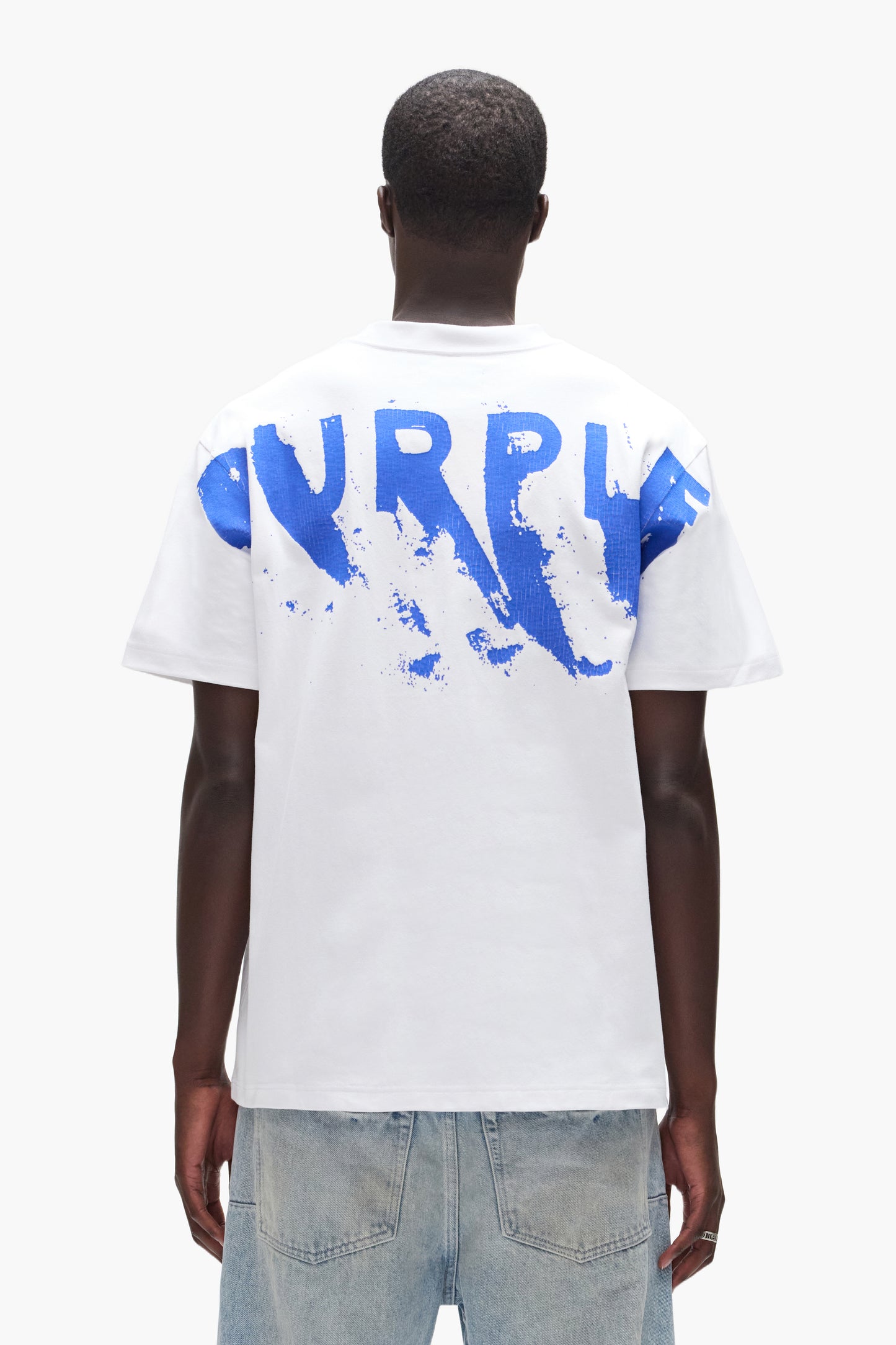 Painted Wordmark Tee in white, heavyweight jersey, featuring crackle print, available in various sizes.