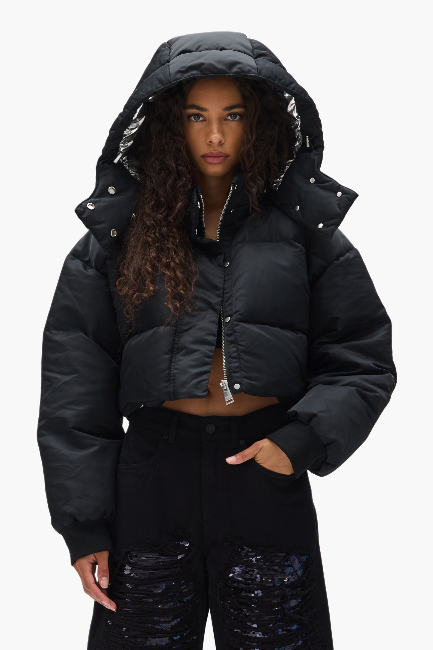 Oversized Puffer Jacket in nylon twill fabric with branded patch, available in various sizes.