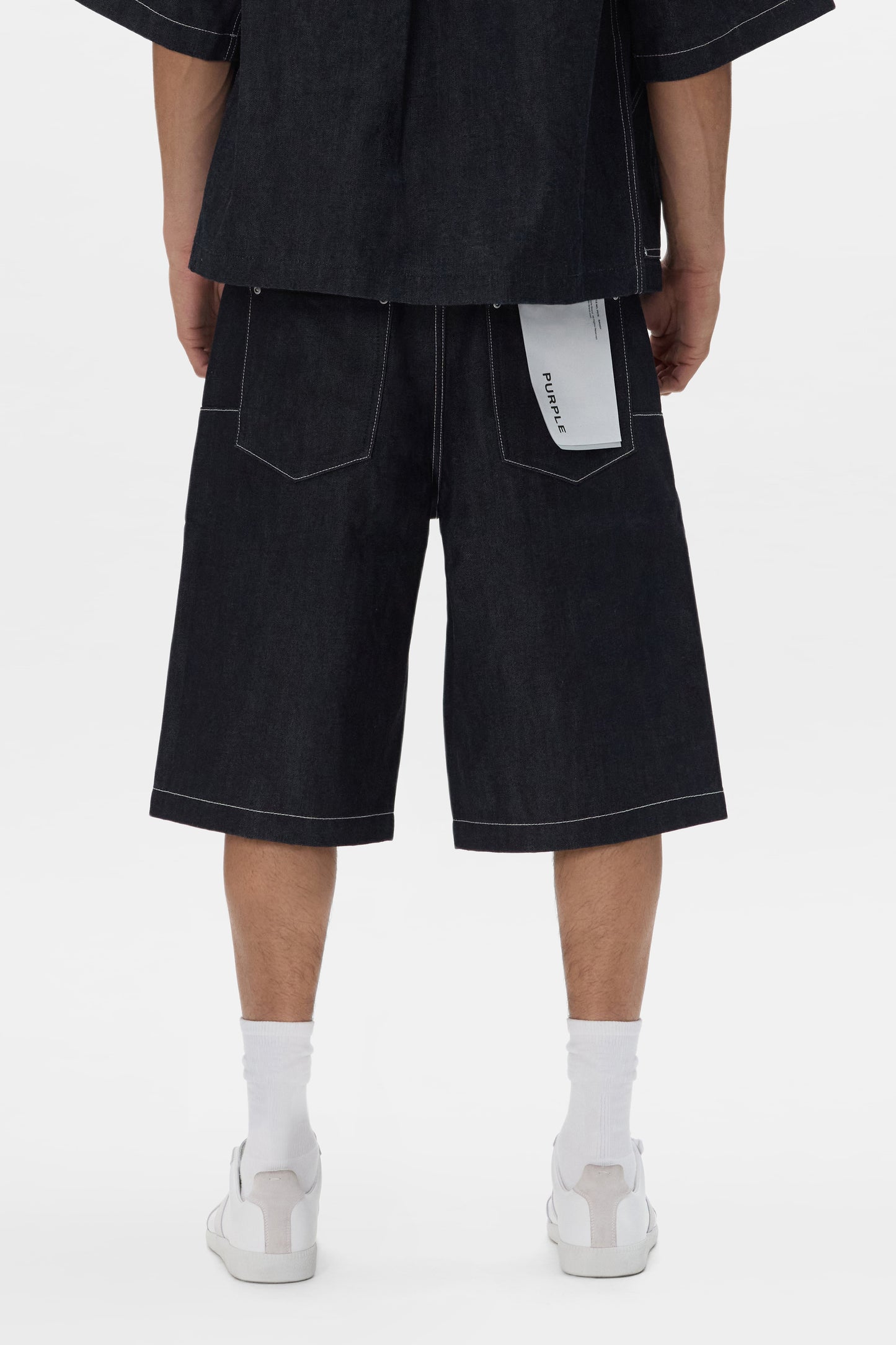 P070 Raw Short in dark indigo with wide leg and reinforced belt loops. Sizes 28-40 available.