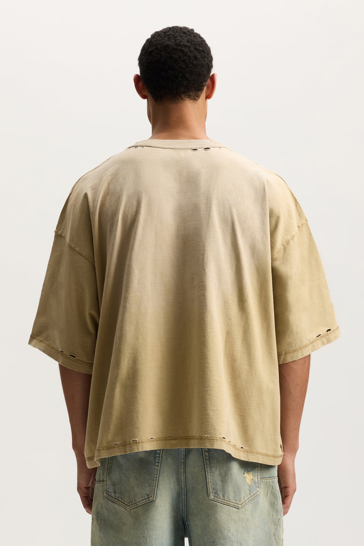 Voltage Script Tee in oversized fit with faded mid acid wash and fine crackle print.