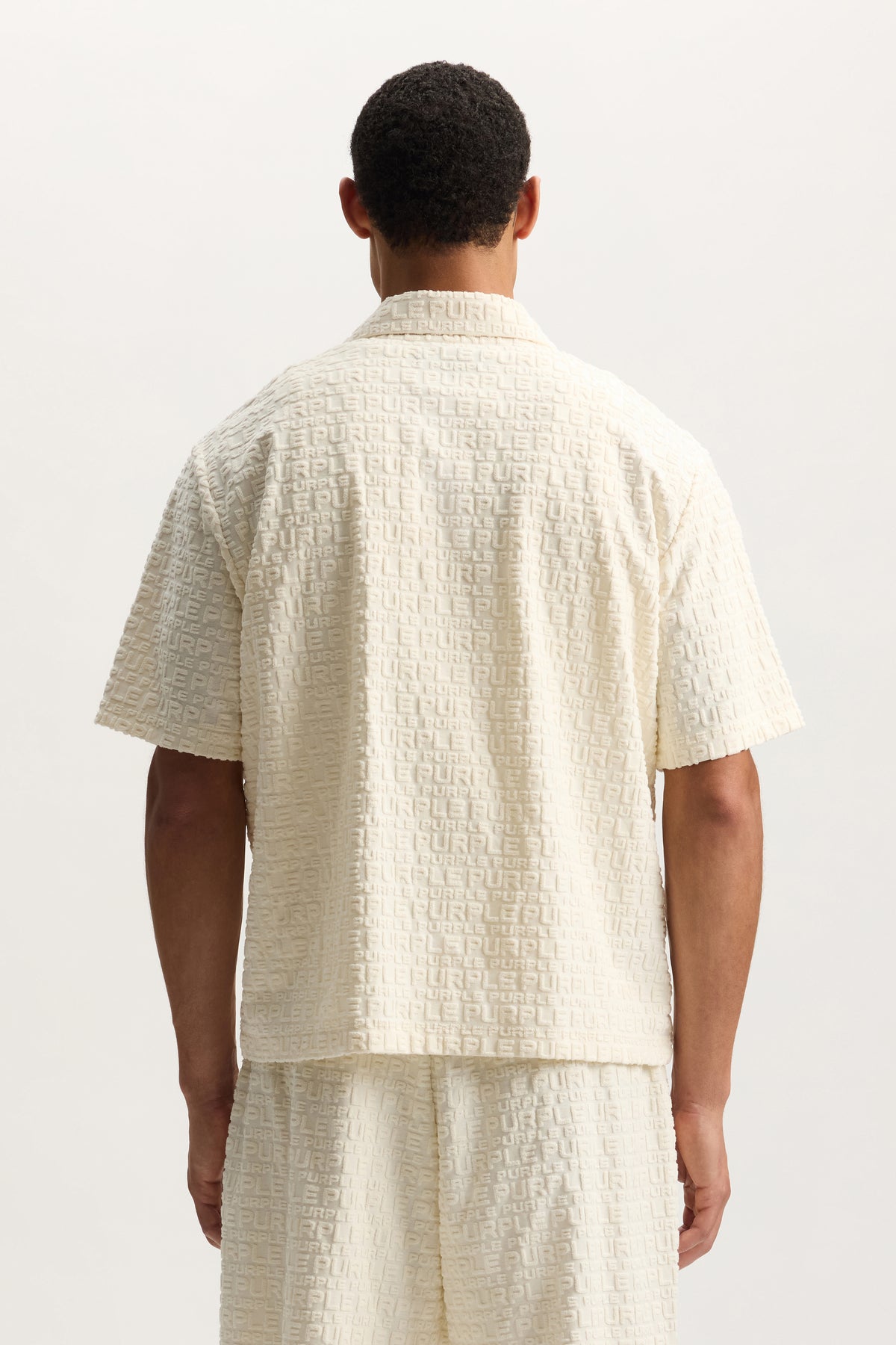 Jacquard Terry Shirt in relaxed fit with wordmark effect, available in sizes XS to 3XL.