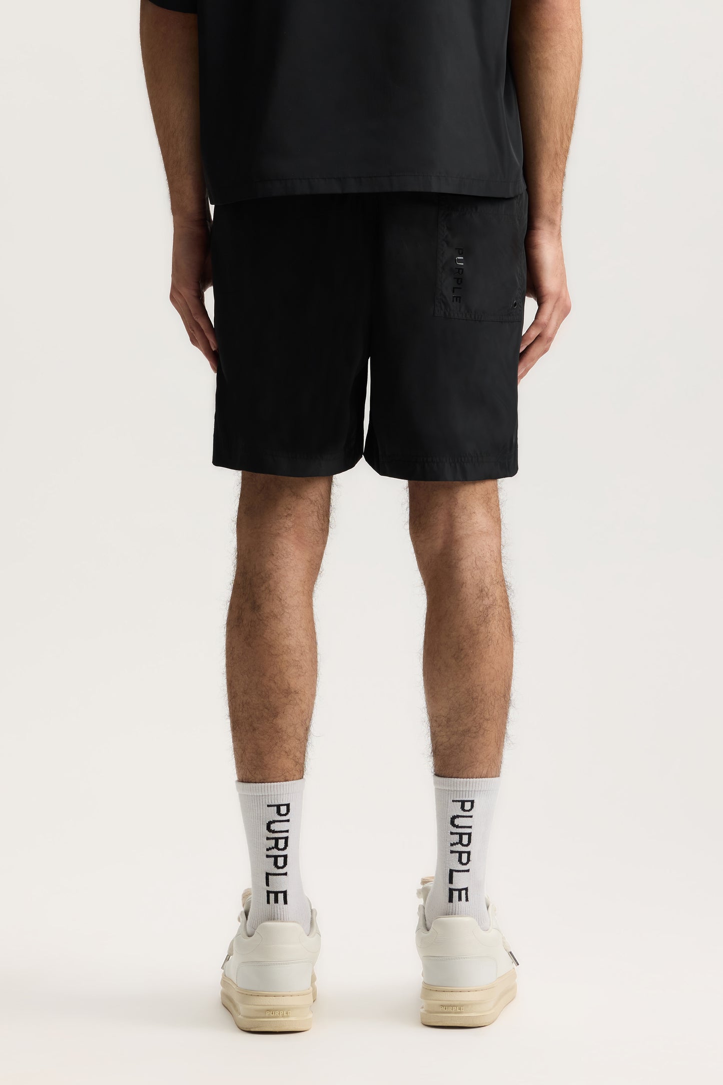 Wordmark Outline Swim Short with elastic waistband and water repellent treatment in multiple sizes