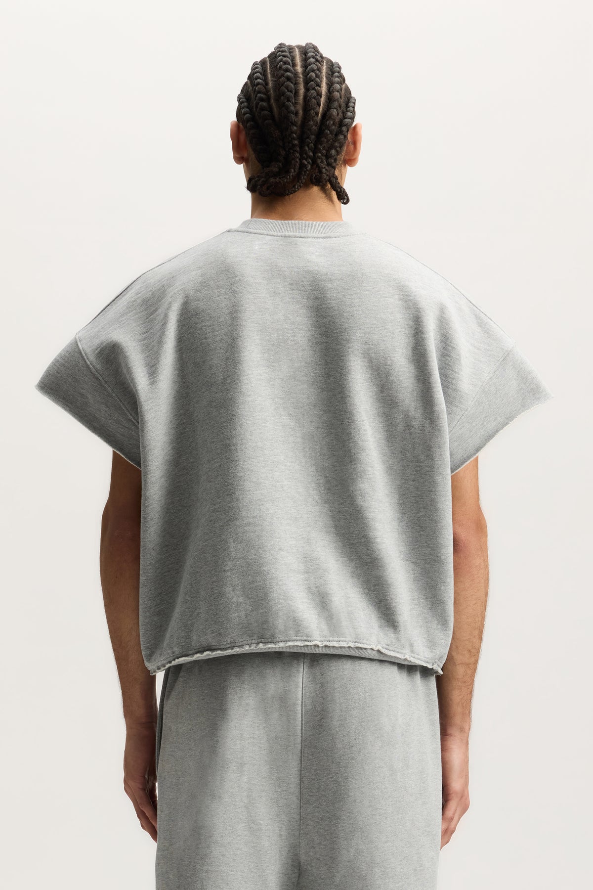 Turbo Type Muscle Tee relaxed fit short sleeve with raw edges, available in multiple sizes.