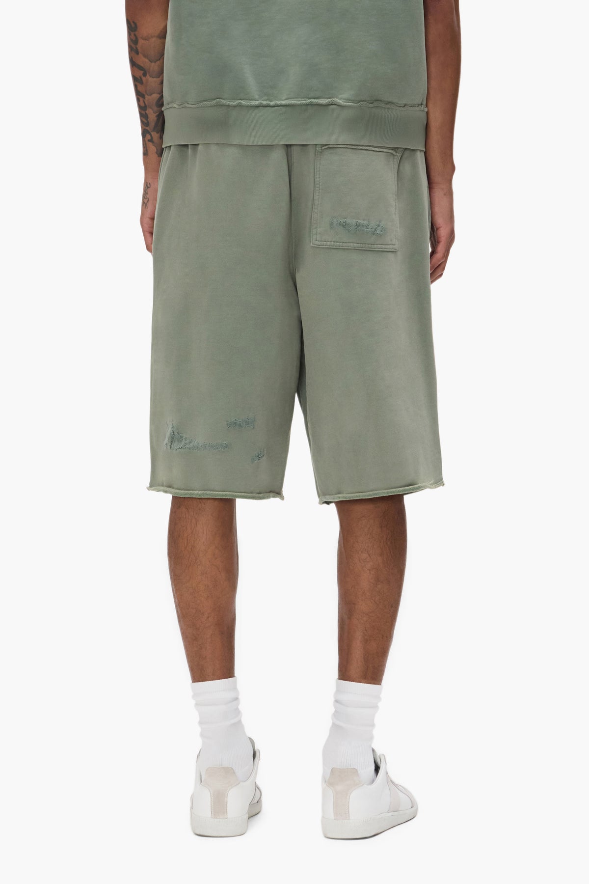 Slugger Script Long Shorts with mid acid wash, elastic waistband, and relaxed fit