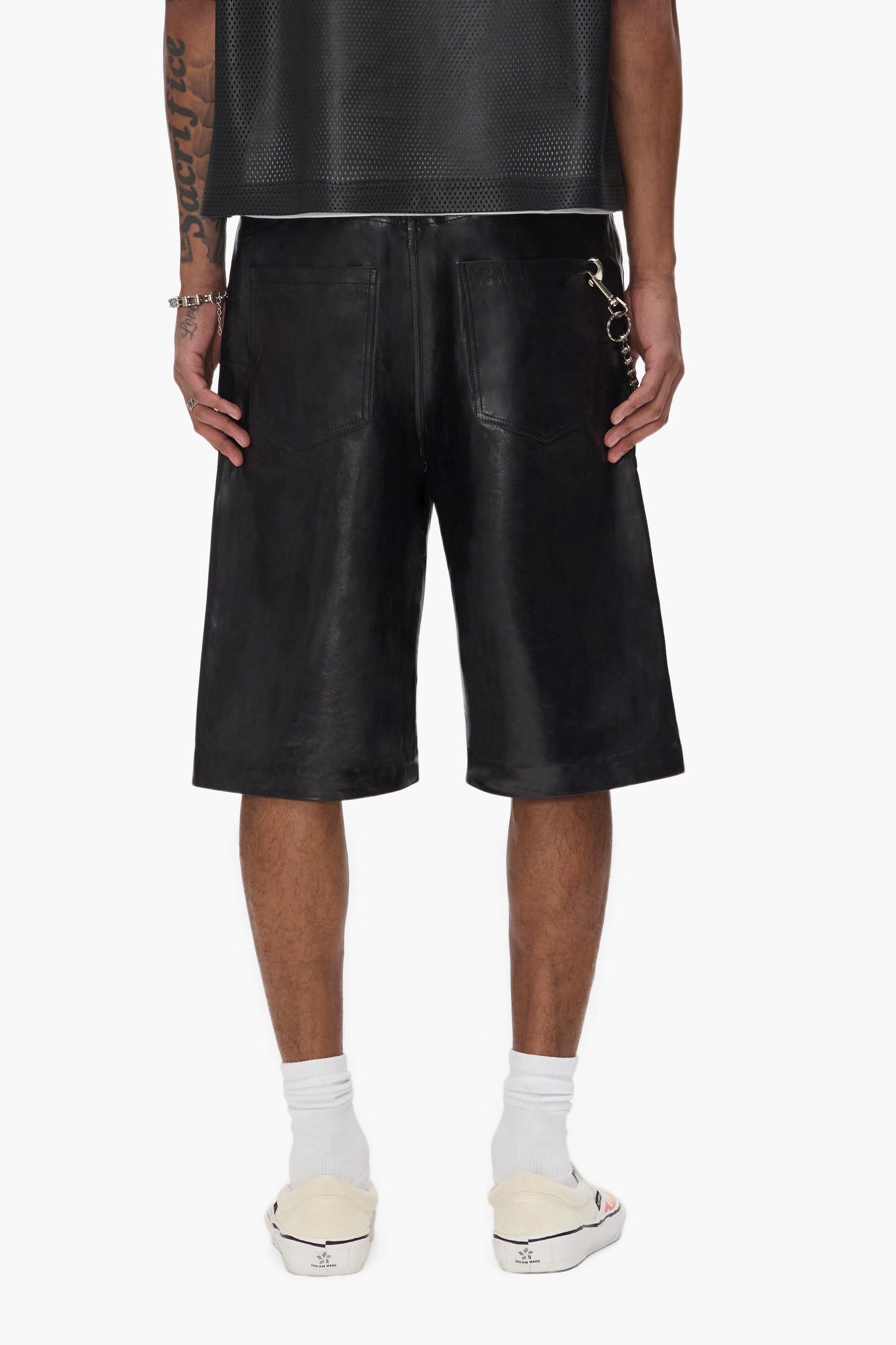 Leather Track Short in black, relaxed fit, made of 100% cow leather with pockets.