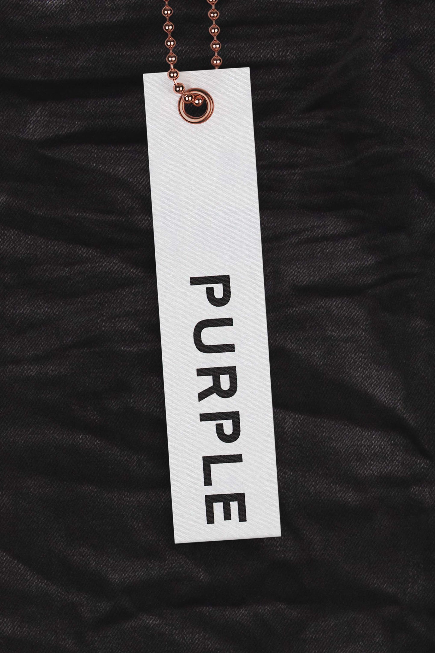 P001 low rise skinny jeans in black resin with classic five pocket styling and button fly closure.