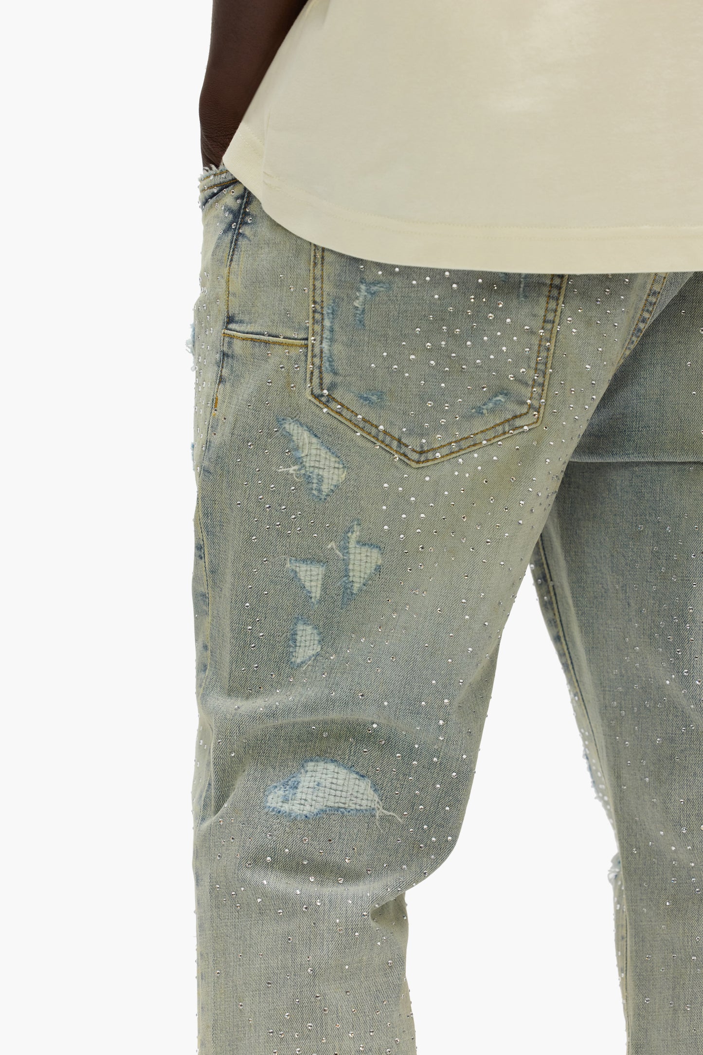 Light Indigo Slim Fit Flared Leg Denim with Crystal Repair and Low Rise, sizes 28-40.