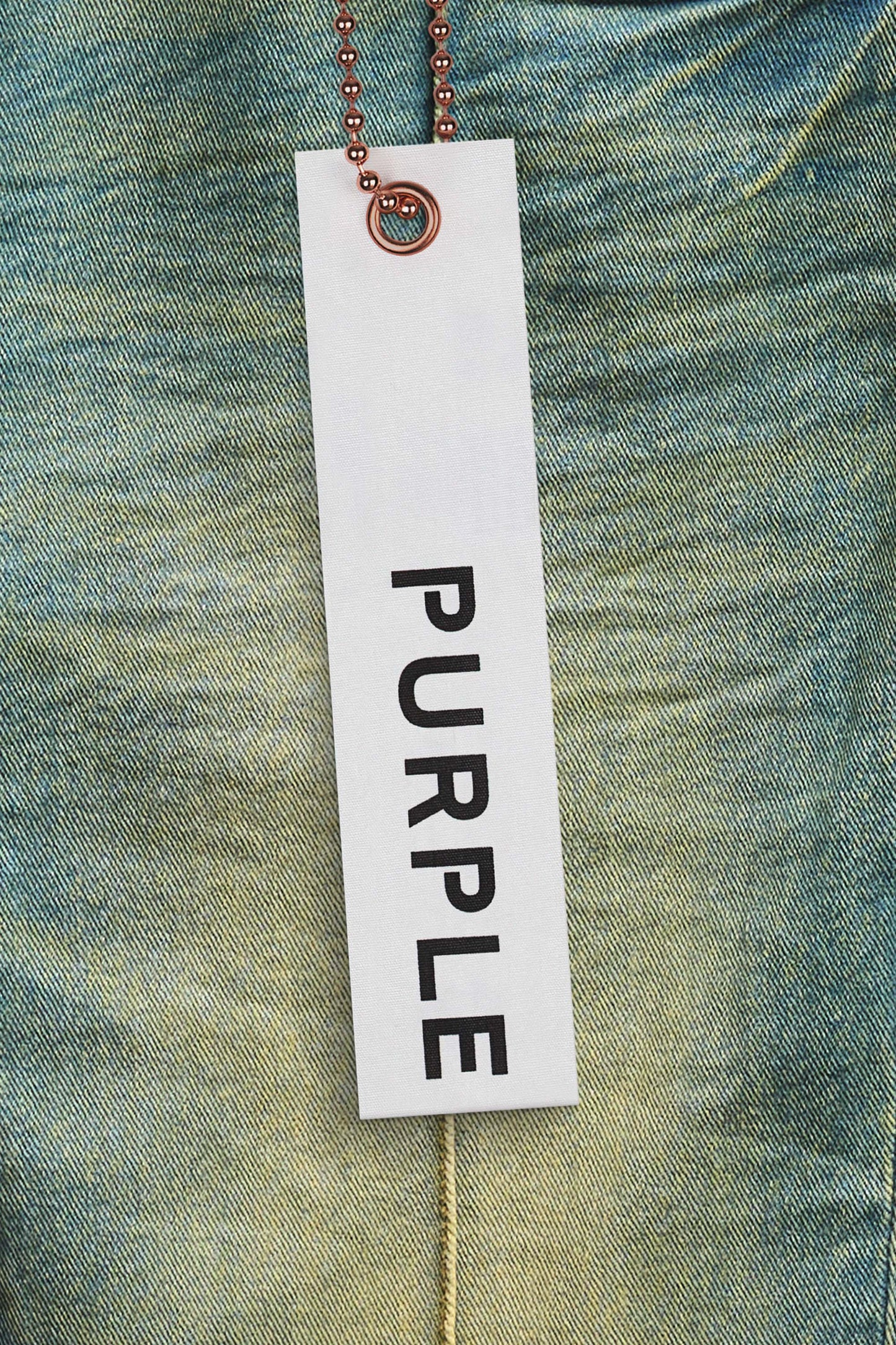P004 Pintuck Flare Overdye light indigo wash denim with pintuck seams and reinforced pockets.