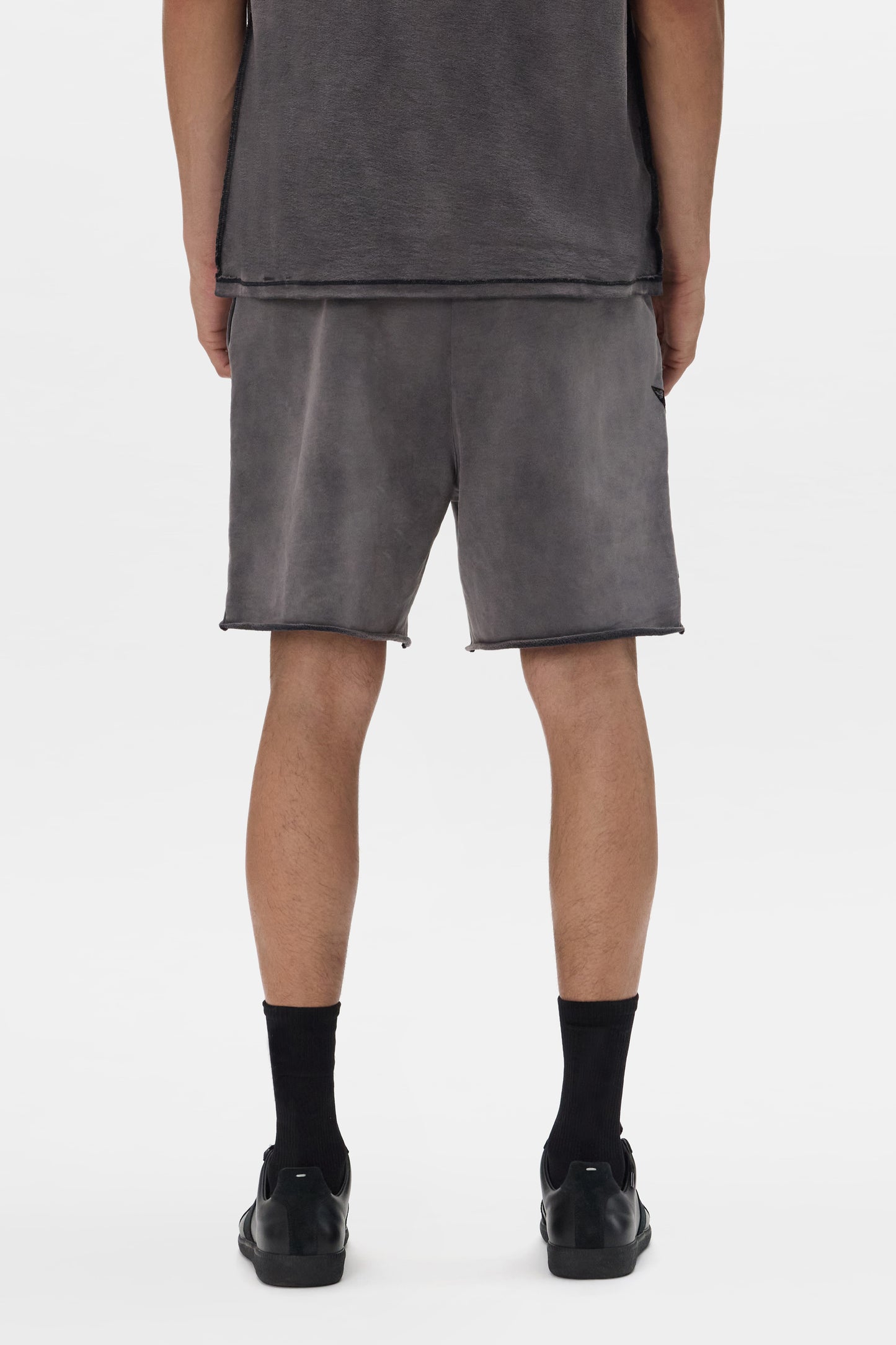 Star Wordmark Short, relaxed fit, heavy bleached wash with flocking printed design.