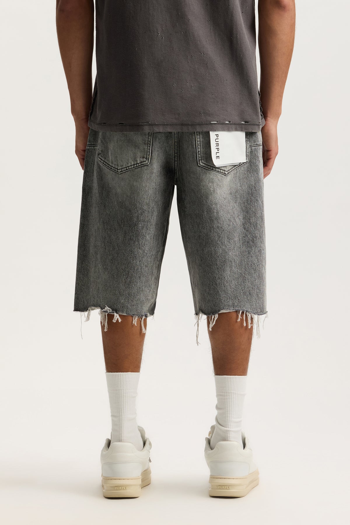 P070 High Summer Destroy Short with wide leg, button fly, and shark bite hem in various sizes.