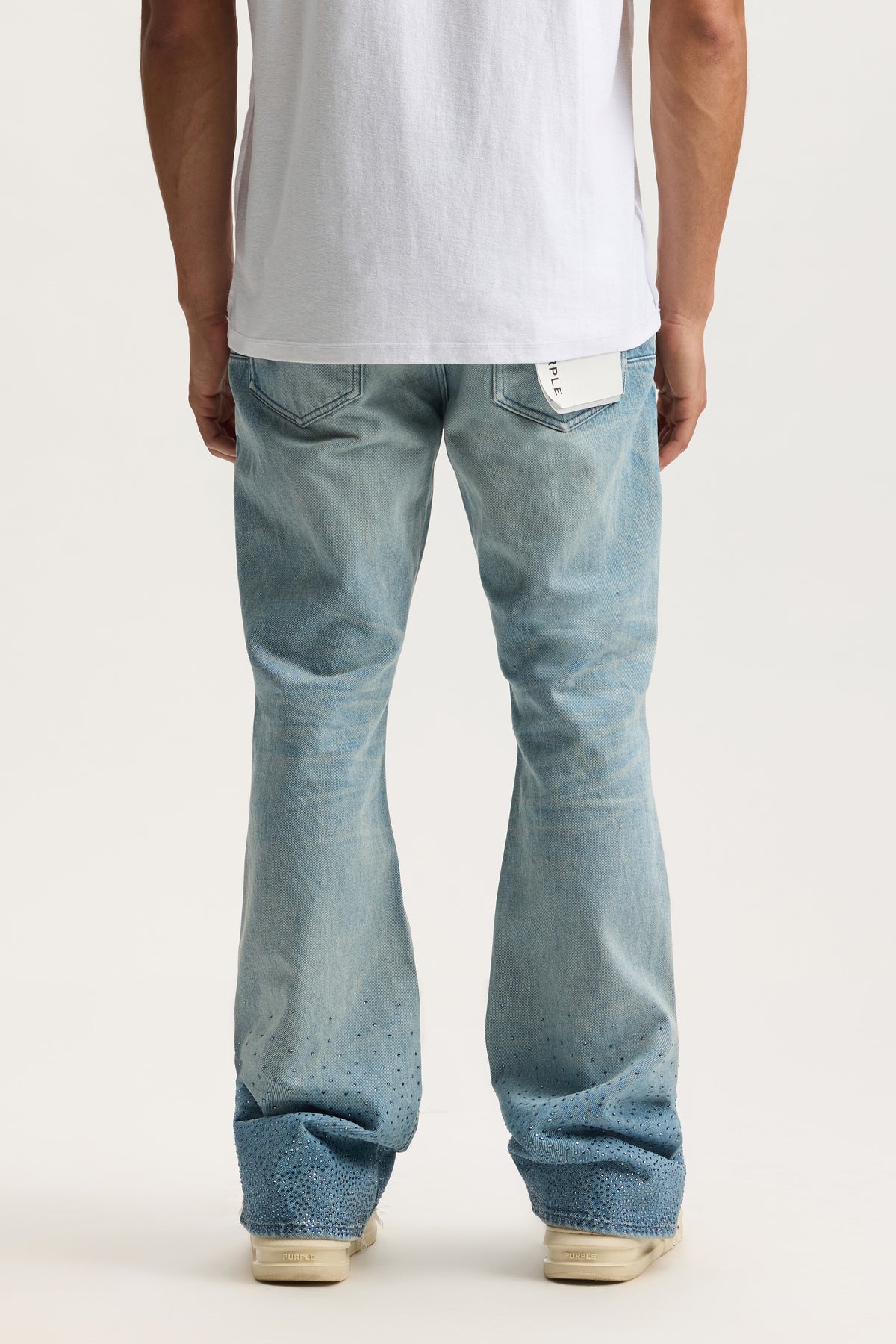 High Contrast Bling Bootcut Denim with Sharkbite Hem, available in sizes 28-40.