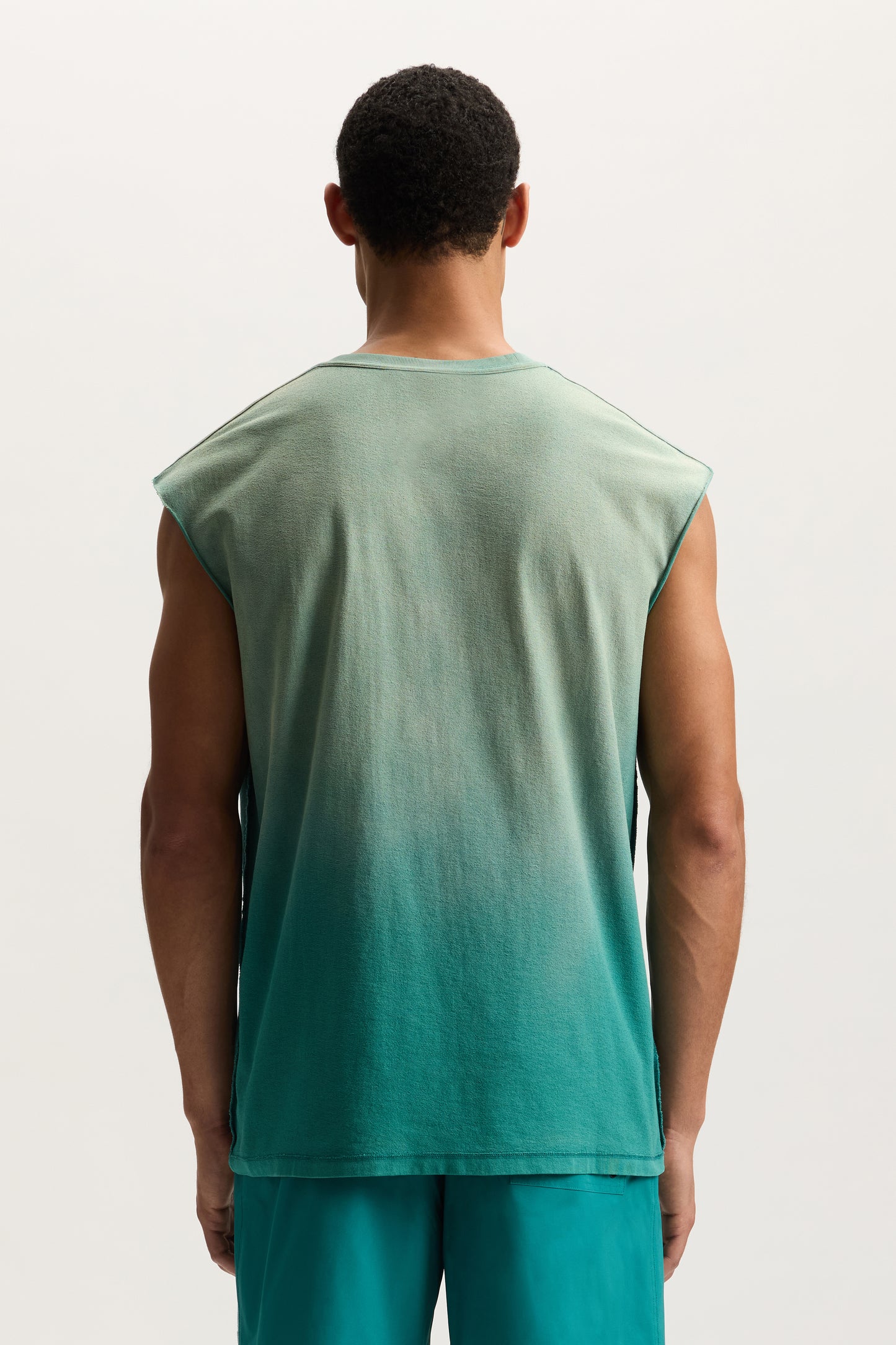 Amplified Tank Top in textured jersey with yellowing spray and white crystal fine rocks design.