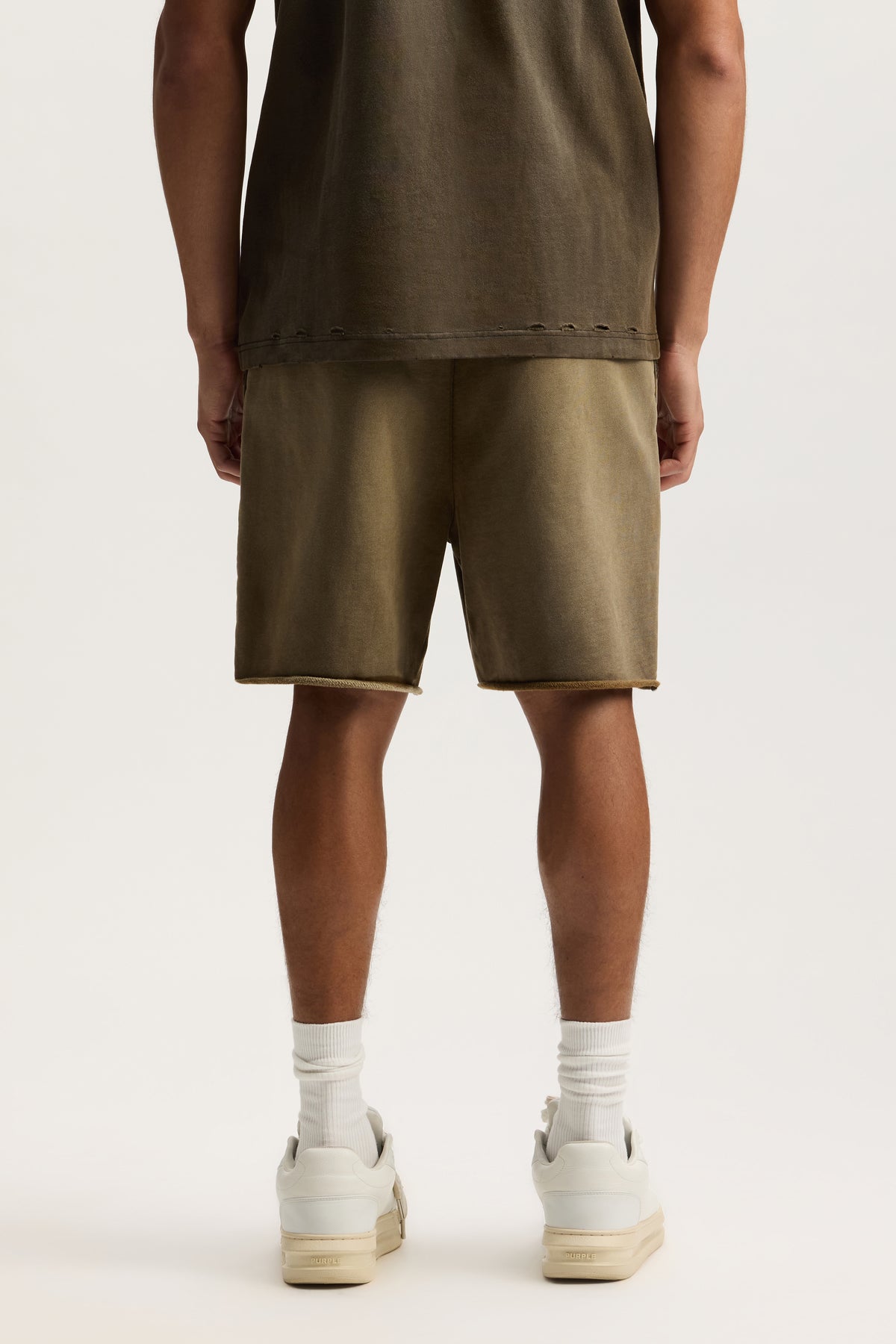 Slab Outline Short in Heavy Bleach Wash with elastic waistband and on-seam hand pockets.