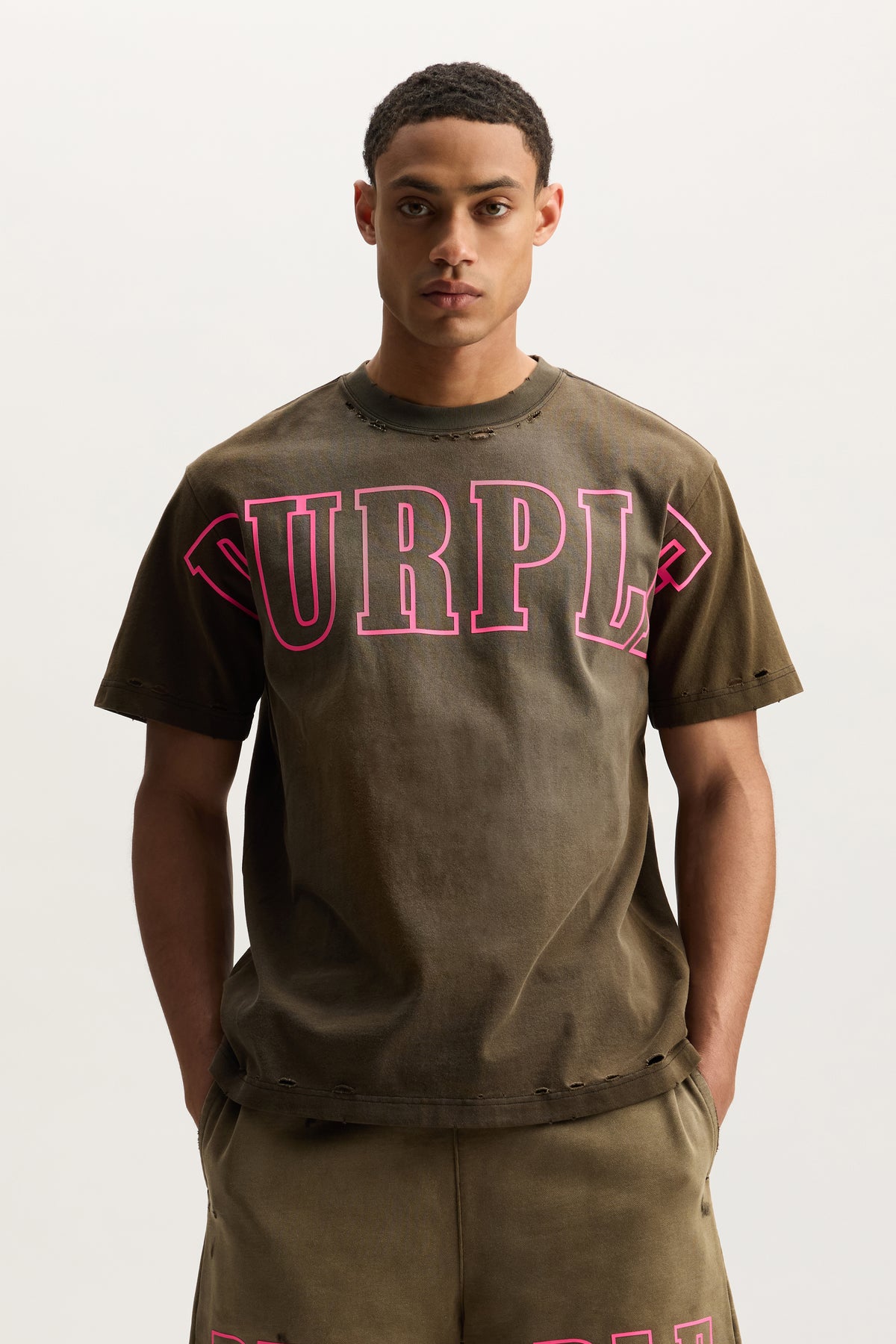 Slab Outline Tee in heavyweight jersey with raised matte silicone and distressing details.