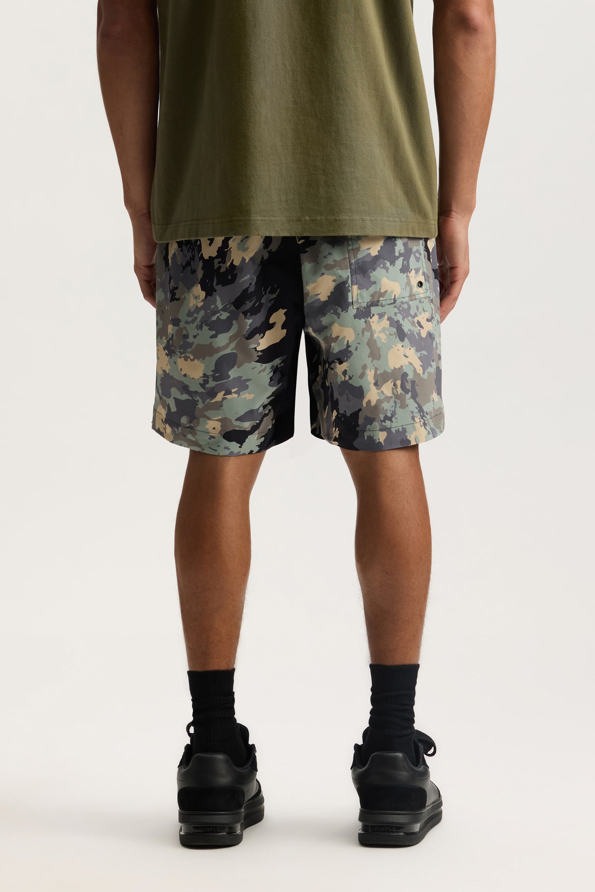 Paint Camo All Around Short in woven polyester with water repellent treatment and elastic waistband.