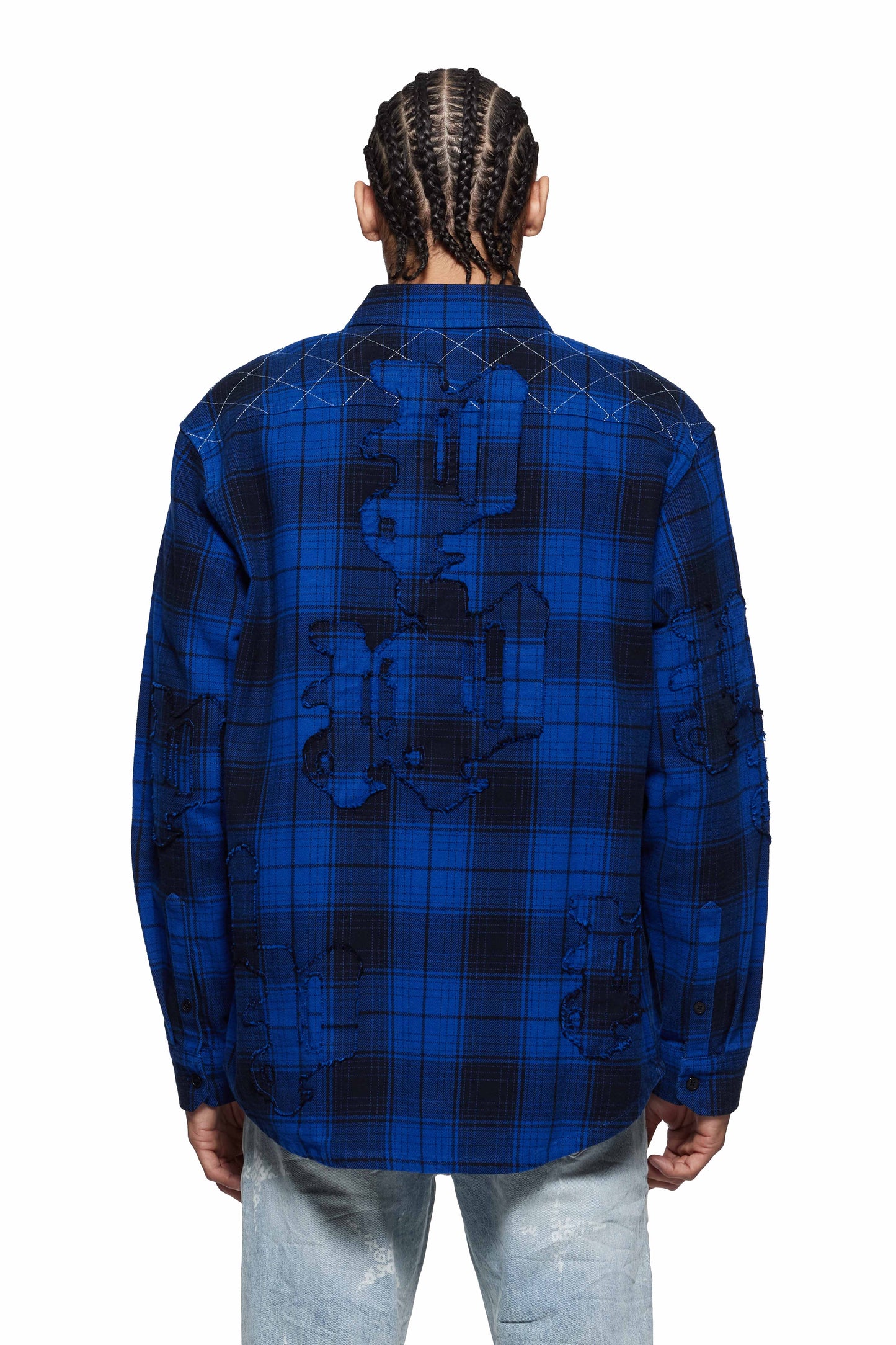 Gothic P Flannel Shirt in black and blue plaid with double flap pockets and curved hem