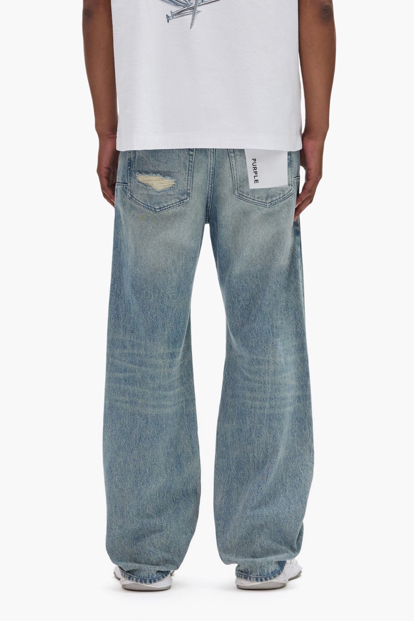 Beaded Repair Mid Rise Denim with back pockets and beaded patches in size 28 to 40.