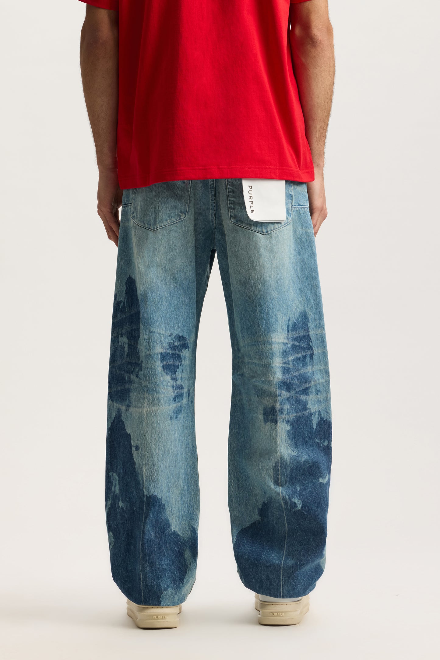 Tailored Selvedge denim in various sizes with mid rise, baggy fit, and selvedge detailing.