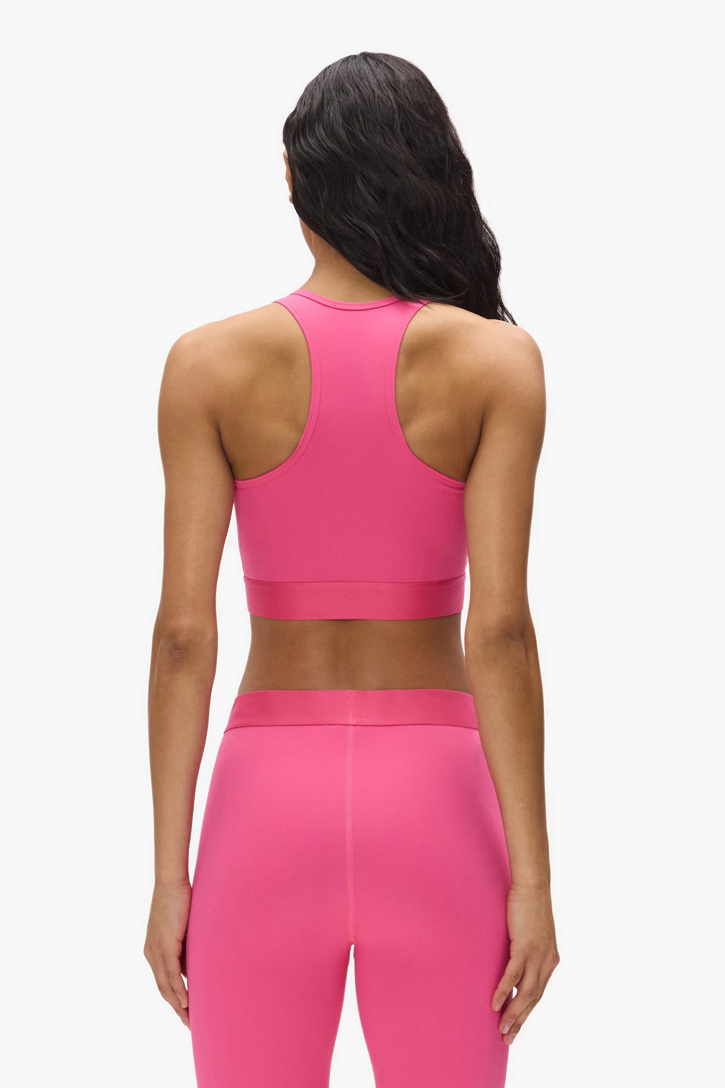 Nylon Bralette in pink with branded elastic, available in sizes XXS to XL.