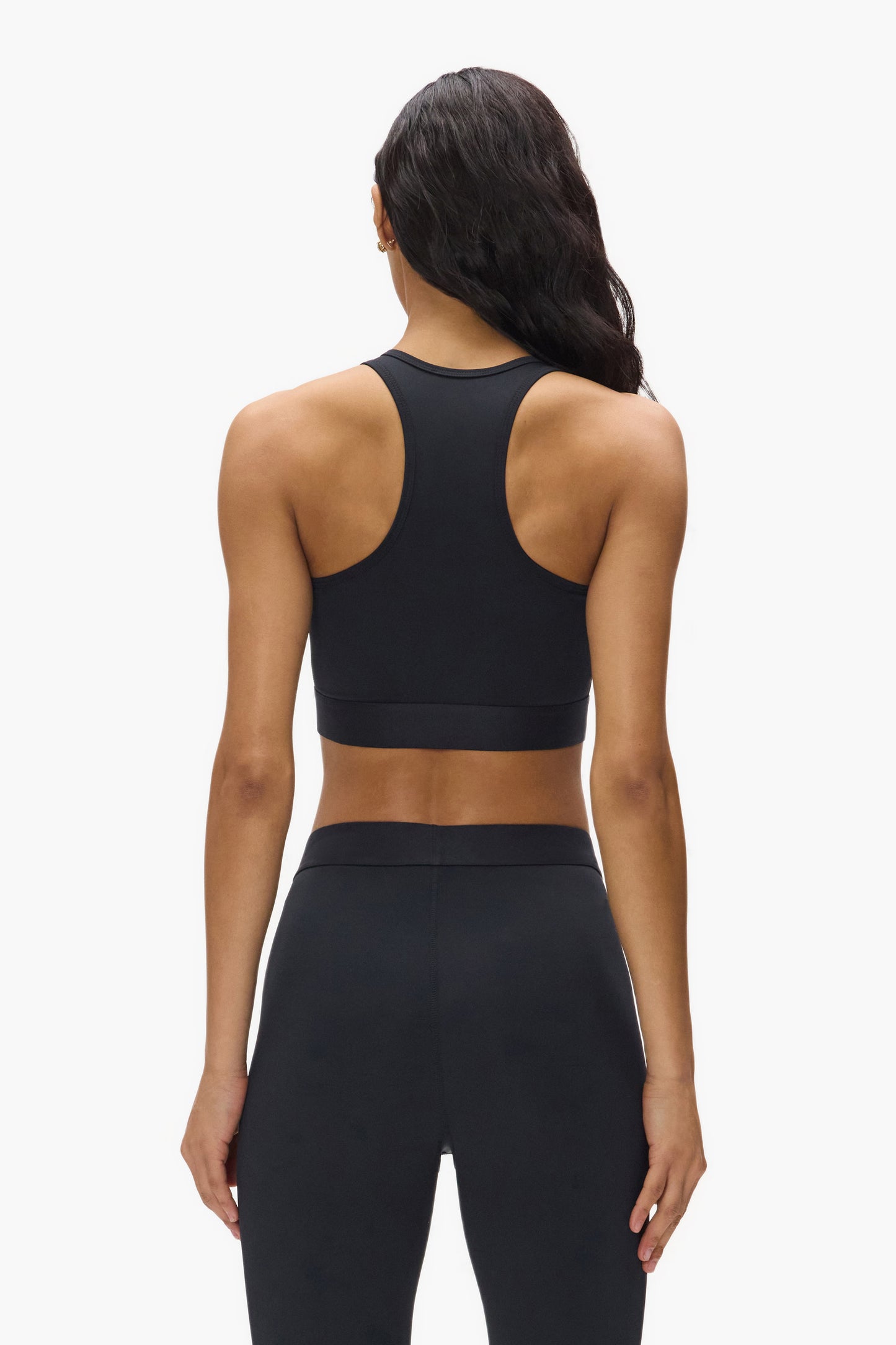 Nylon bralette with branded elastic, available in sizes XXS to XL.