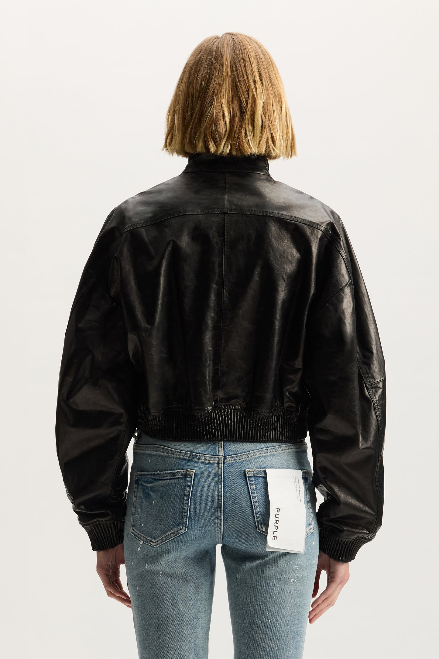 Patent Leather Jacket in shiny patent leather with relaxed fit, available in sizes XXS to XL.