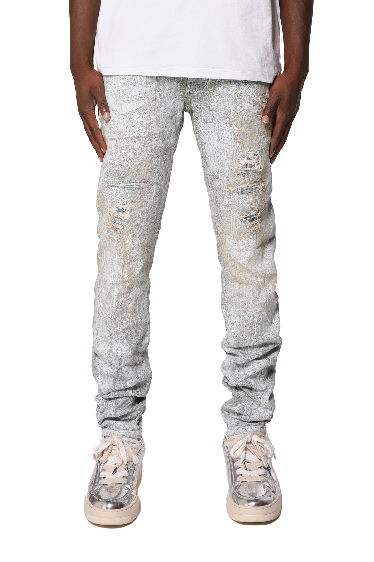 Tinted Jacquard Monogram Denim, low rise, stretch skinny, available in sizes 28 to 40.