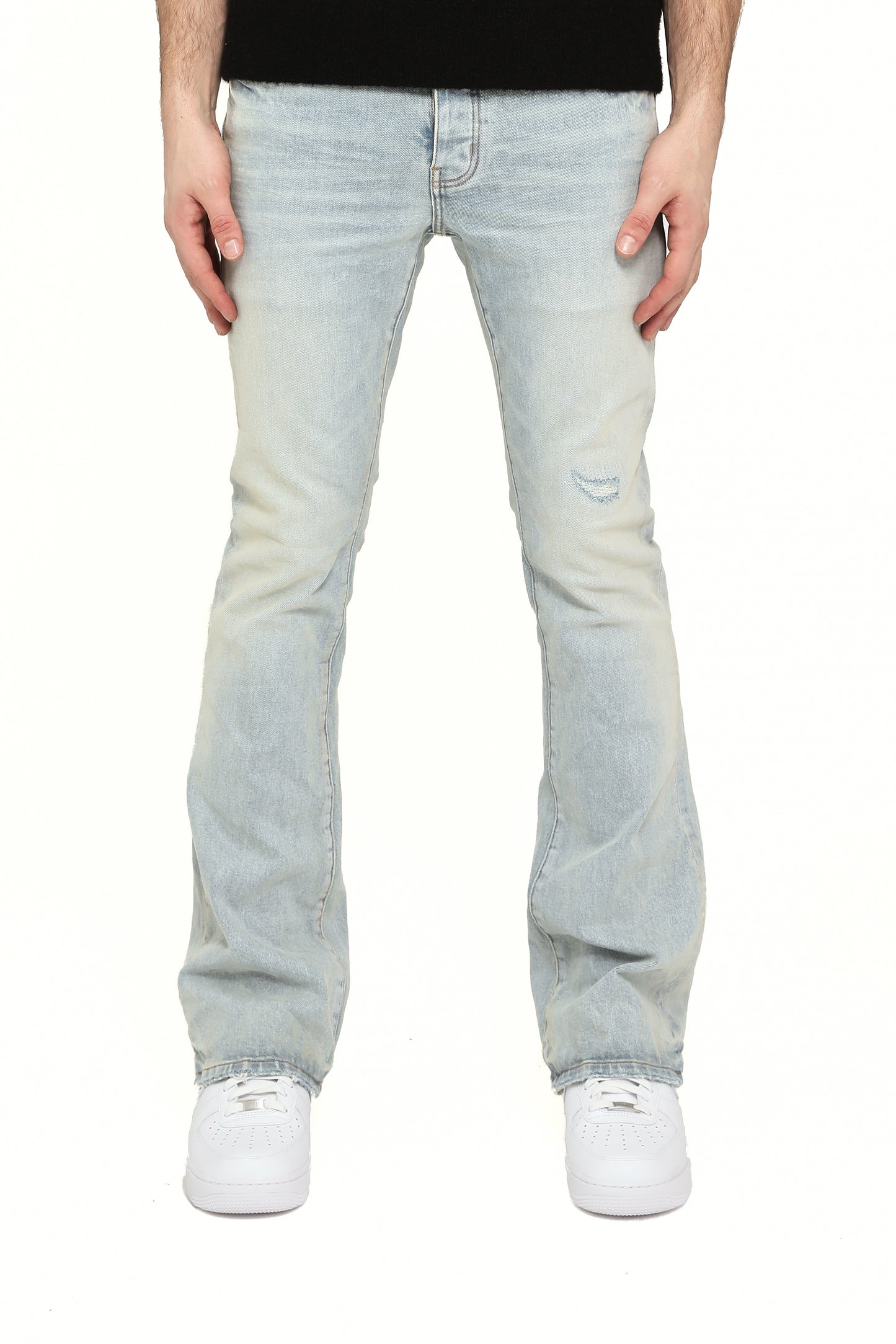 Slim fit distressed jeans with flared leg and low rise, part of the WHITE LABEL collection.