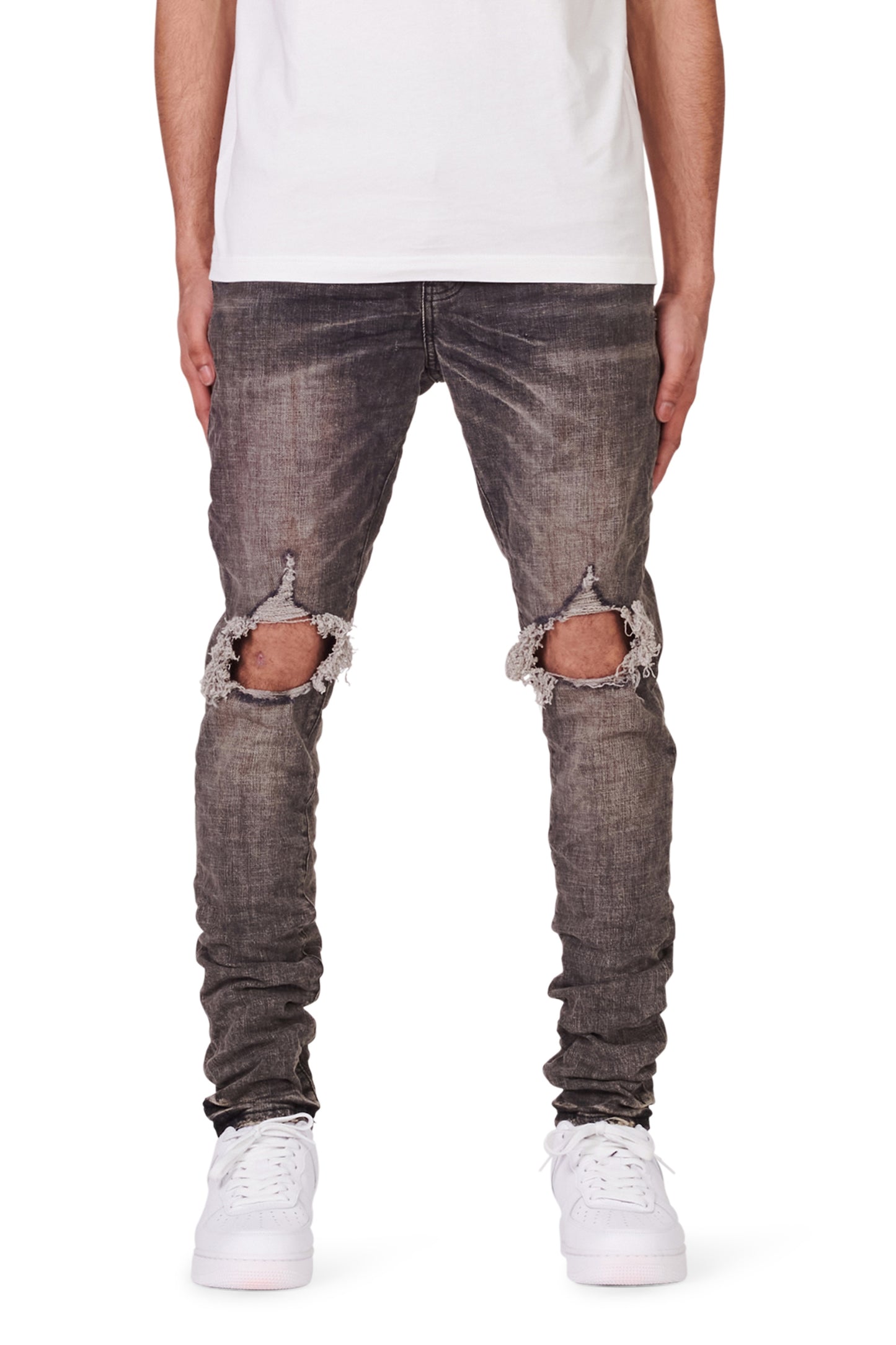 Vintage Worn Blowout Denim with heavy distressing and knee blowouts, sizes 28-40.