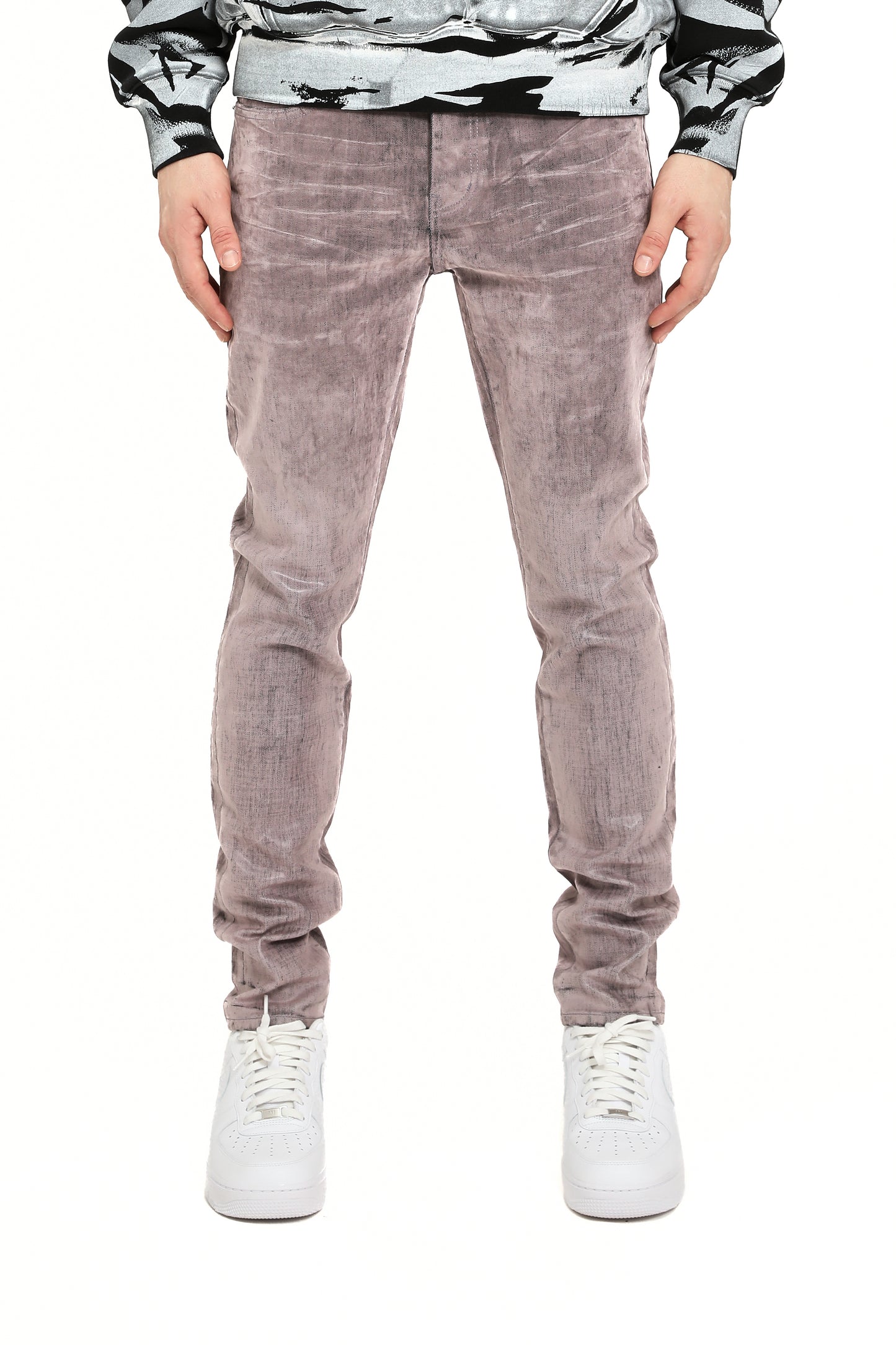 Flock Dipped low rise stretch skinny denim with unique finish, available in sizes 28 to 40.