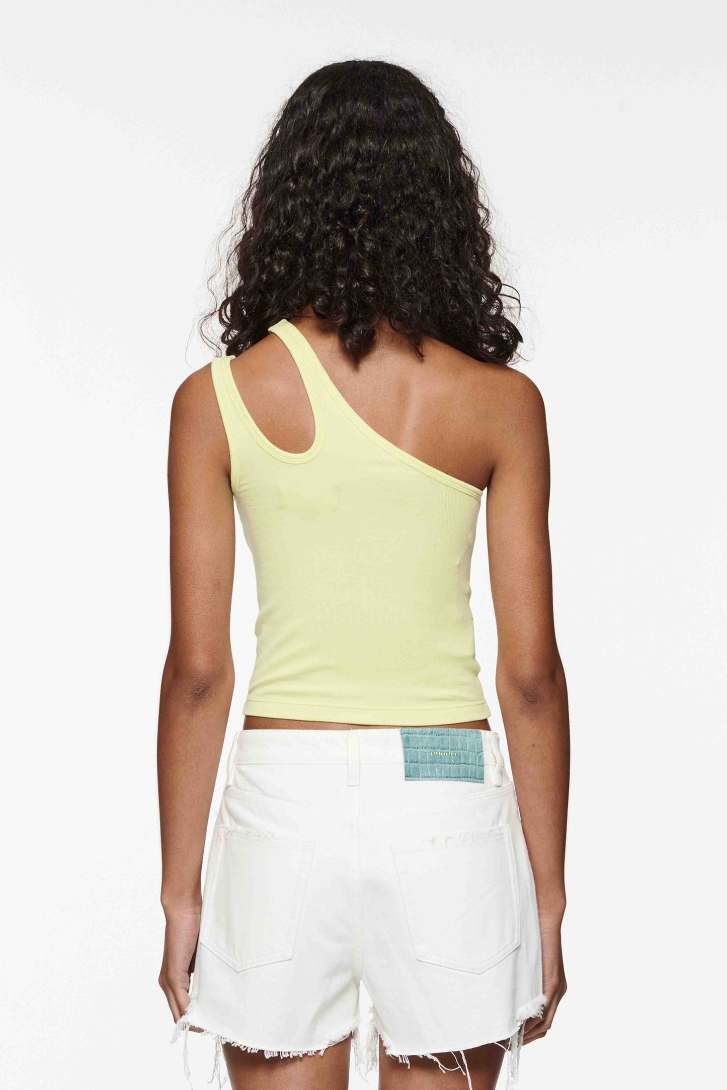 Rib Cut Out Tank Tee with stretch fit and cut out design on shoulder in various sizes.