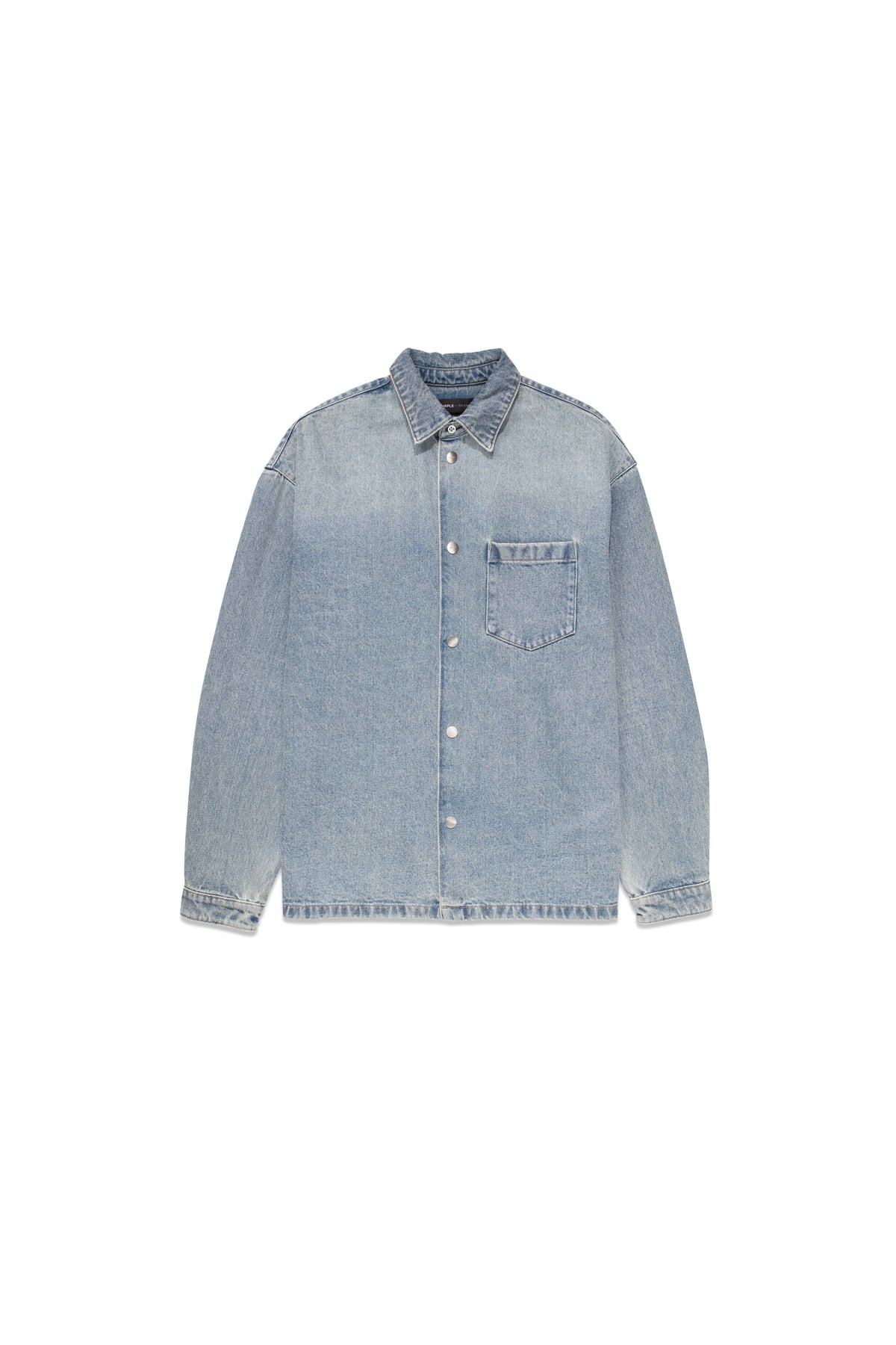 Long sleeve shirt jacket in indigo with snap front, patch pocket, and adjustable cuffs.