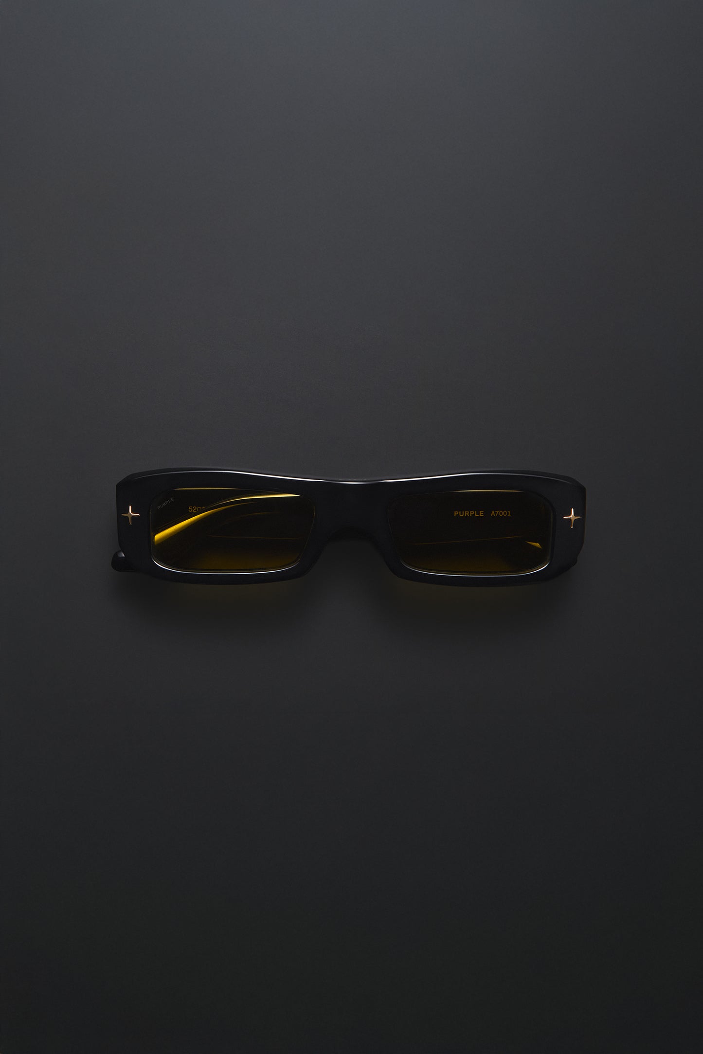 V002 Mercer rectangular sunglasses with warm yellow tinted TRX lenses and acetate frame.