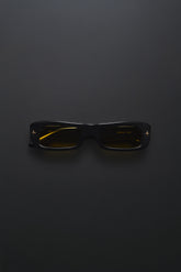 V002 Mercer rectangular sunglasses with warm yellow tinted TRX lenses and acetate frame.