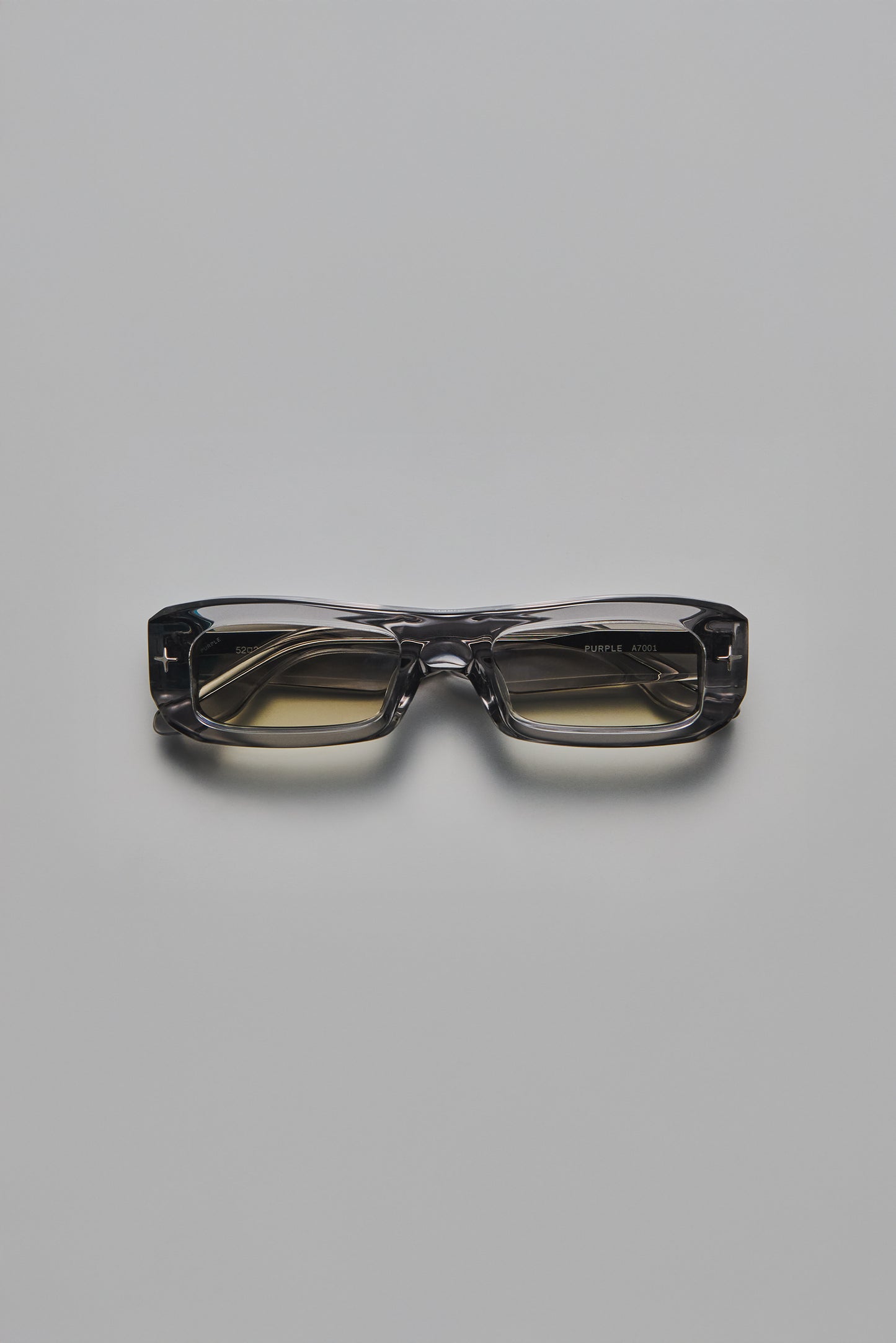 V002 Mercer rectangular sunglasses with semi-transparent acetate frame and light silver tinted lenses
