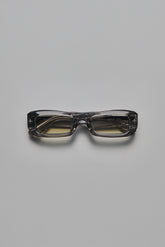V002 Mercer rectangular sunglasses with semi-transparent acetate frame and light silver tinted lenses