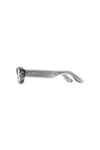 V002 Mercer sunglasses, rectangular acetate frame, semi-transparent, light silver tinted lenses.