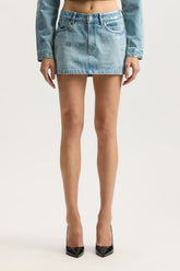 Monogram Mini Skirt in various sizes with faded monogram and 5 pocket styling.
