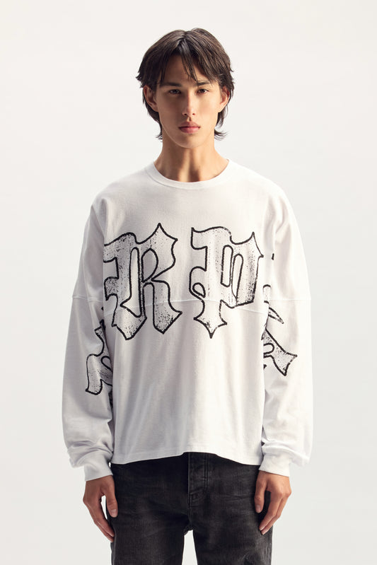 Jumbo Gothic Outlines Long Sleeve Tee in relaxed fit, made from 100% cotton, textured jersey.