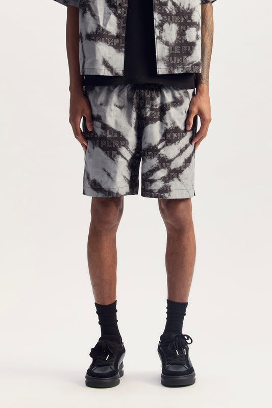 Tie Dye Wordmark All Around Short in regular fit with digital print and embroidery details