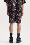Flower Fade All Around Short in regular fit, made of woven water-repellent polyester.