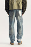 P015 Stamped Foil denim, mid-rise relaxed fit, size 28 with foil and clear tape embellishment.