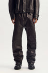 Tech Leather Pant in size XS, made of 100% lambskin with relaxed fit and zipper hand pocket.