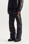 Tech Leather Pant relaxed fit in lambskin with embossed mark and zipper hand pocket.