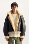 Foil Wordmark Shearling Jacket with debossed logo and detachable hood, relaxed fit.